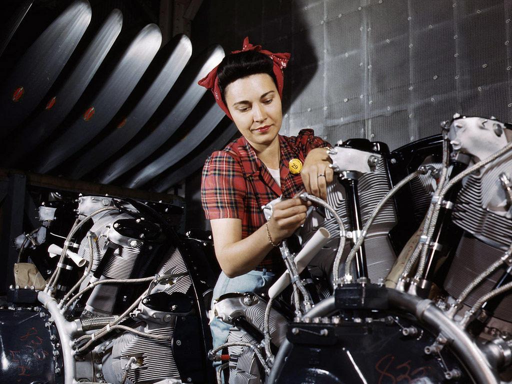 Woman working on motor